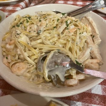 Buca di Beppo Italian Restaurant - Fettuccine Alfredo with Chicken and Shrimp - Italian Near Me - Universal City, California Buca di Beppo Italian Restaurant - Fettuccine Alfredo with Chicken and Shrimp - Italian Near Me - Universal City, California