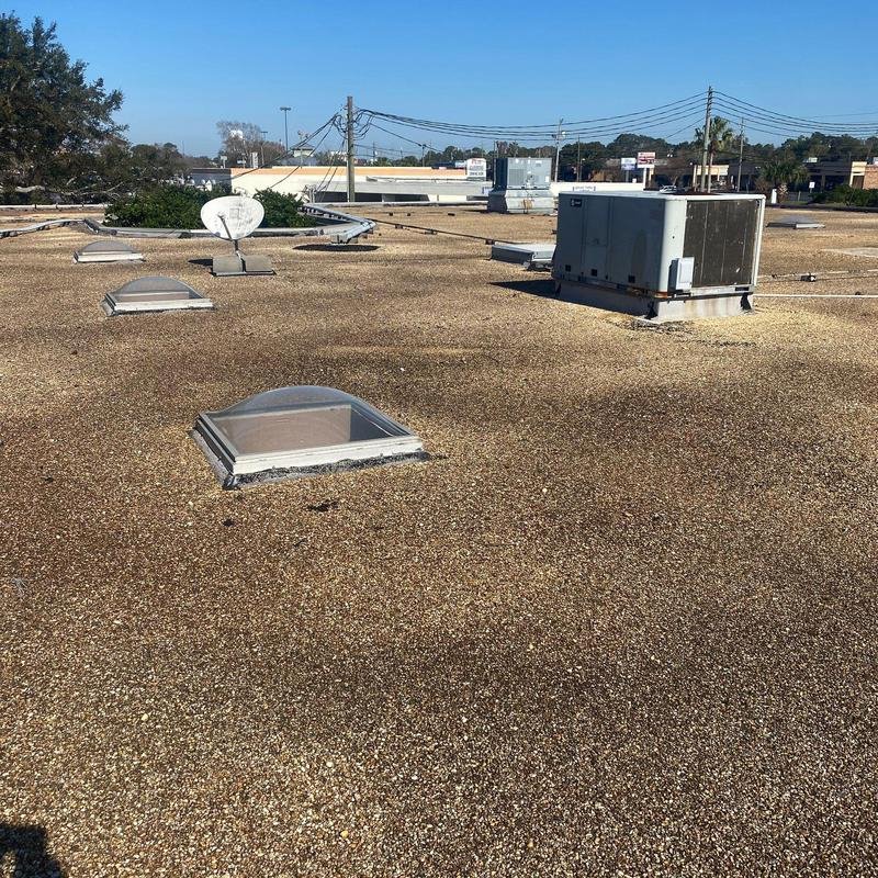 Slide of Tucker Commercial Roofing