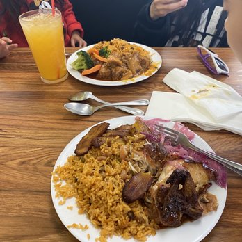 El Rey Del Sabor - two children sitting at a table with plates of food - Honduran Near Me - Irving, Texas