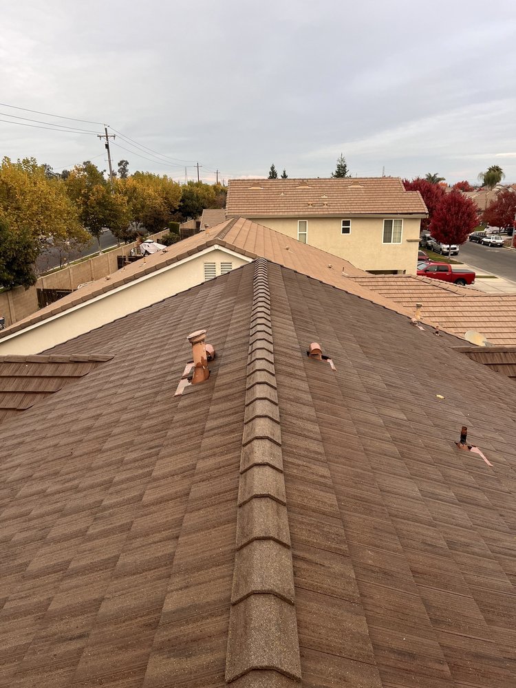 Slide of Top Notch Roof & Gutter Cleaning