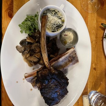 Fahrenheit 132 - Veal Tomahawk steak with bone marrow butter, heavily salted mushrooms and creamed kale - Steakhouses Near Me - Fredericksburg, Virginia Fahrenheit 132 - Veal Tomahawk steak with bone marrow butter, heavily salted mushrooms and creamed kale - Steakhouses Near Me - Fredericksburg, Virginia