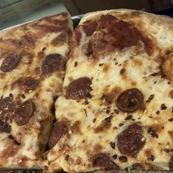 District 999 - Large cheese and pepperoni. Nice neutral sauce. I hate sweet. Sorry we ate 1/2 lol