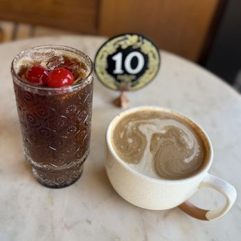FeelLove Coffee Loveland - Cupids Midnight Cold brew and a latte - Coffee & Tea Near Me - Loveland, Colorado FeelLove Coffee Loveland - Cupids Midnight Cold brew and a latte - Coffee & Tea Near Me - Loveland, Colorado
