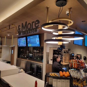 &More - a man sitting at a counter in a restaurant - Coffee & Tea Near Me - Anaheim, California &More - a man sitting at a counter in a restaurant - Coffee & Tea Near Me - Anaheim, California