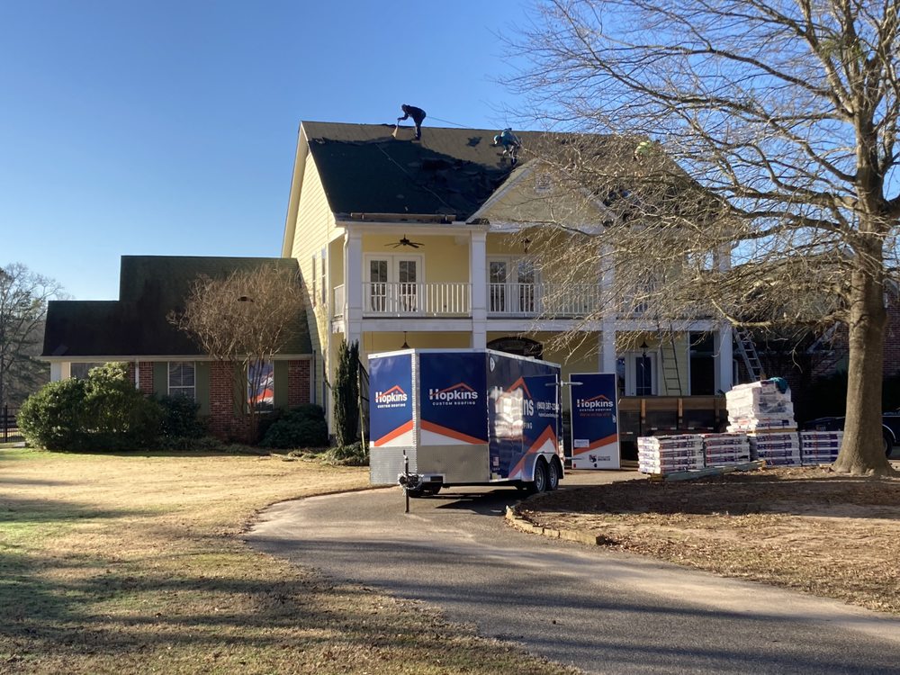 Slide of Hopkins Custom Roofing
