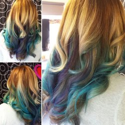 Amanda ~ Blonde Ombre with Balayaged Teal and Blue Peek-a-boos. Long layered textuized cut.  www.zensalonatthelanding.com