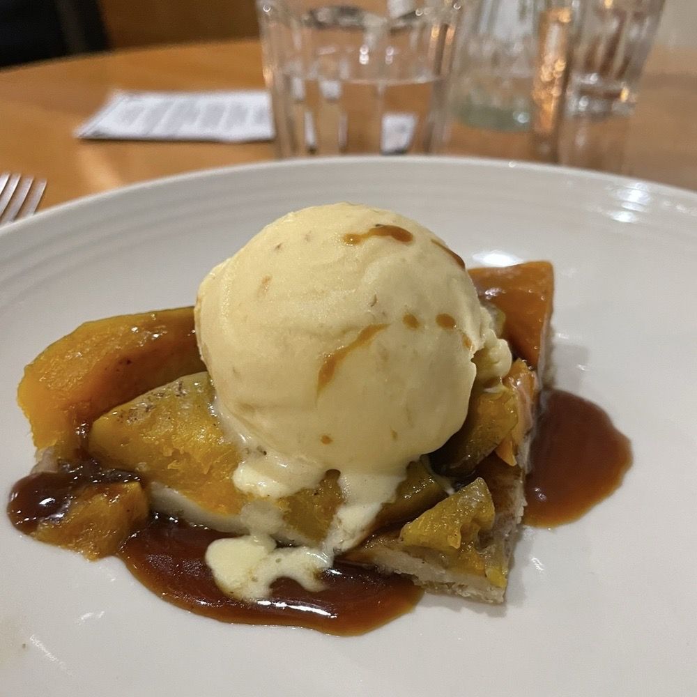 Atwater's - Catonsville - Sweetened butternut squash Tatin tart, topped with ice cream flavored by banana-like country paw paw fruits. - Coffee & Tea Near Me - Catonsville, Maryland Atwater's - Catonsville - Sweetened butternut squash Tatin tart, topped with ice cream flavored by banana-like country paw paw fruits. - Coffee & Tea Near Me - Catonsville, Maryland