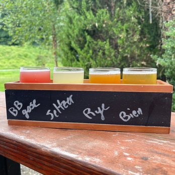 Caboose Tavern - Flight (blackberry gose, peach basil seltzer, chamomile rye table beer, and bienvenidos Mexican lager) - New American Near Me - Vienna, Virginia Caboose Tavern - Flight (blackberry gose, peach basil seltzer, chamomile rye table beer, and bienvenidos Mexican lager) - New American Near Me - Vienna, Virginia