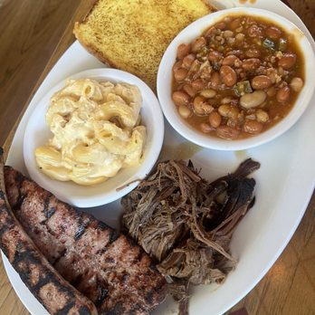 Bill & Tim's Barbecue - Husbands plate cold straight from the kitchen. Pork links, shredded brisket Mac & Cheese and Pork & Beans - Barbeque Near Me - Eugene, Oregon Bill & Tim's Barbecue - Husbands plate cold straight from the kitchen. Pork links, shredded brisket Mac & Cheese and Pork & Beans - Barbeque Near Me - Eugene, Oregon
