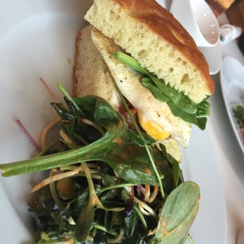 Little Brick - Breakfast sandwich with cured bacon, over easy egg, aioli, and arugula - Cafes Near Me - Edmonton, Alberta Little Brick - Breakfast sandwich with cured bacon, over easy egg, aioli, and arugula - Cafes Near Me - Edmonton, Alberta