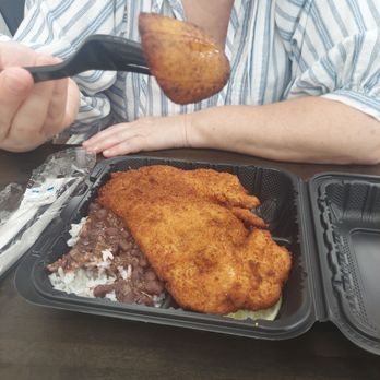 Nelly's Cuban Cafe - Milanesa De Pollo with beans and rice and plantains tasted perfect it was a larve portion you womt leave hungery - Cuban Near Me - Grants Pass, Oregon
