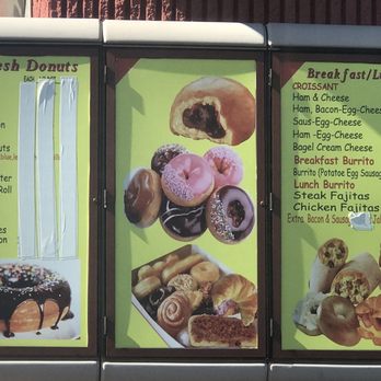 Ray's Donuts - A side view of the building with the menu posted on wall. It shares a parking lot with the EXXON station - Donuts Near Me - Buford, Georgia Ray's Donuts - A side view of the building with the menu posted on wall. It shares a parking lot with the EXXON station - Donuts Near Me - Buford, Georgia