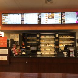 a counter with a variety of food items a counter with a variety of food items