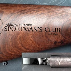 Grand Awards - Grand Awards has the capability to machine etch, laser etch or sandblast just about anything. Here is a rifle stock and trigger guard.