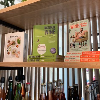 The Holly - a shelf of wine and books - Wine Bars Near Me - Fort Worth, Texas The Holly - a shelf of wine and books - Wine Bars Near Me - Fort Worth, Texas