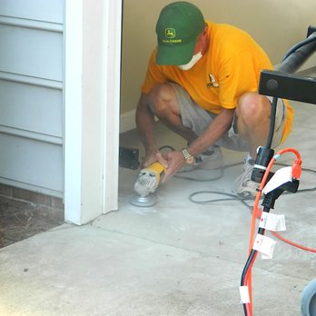 IronDrive Garage Floors - a man using a grinder - Home & Garden Near Me - Easley, South Carolina IronDrive Garage Floors - a man using a grinder - Home & Garden Near Me - Easley, South Carolina