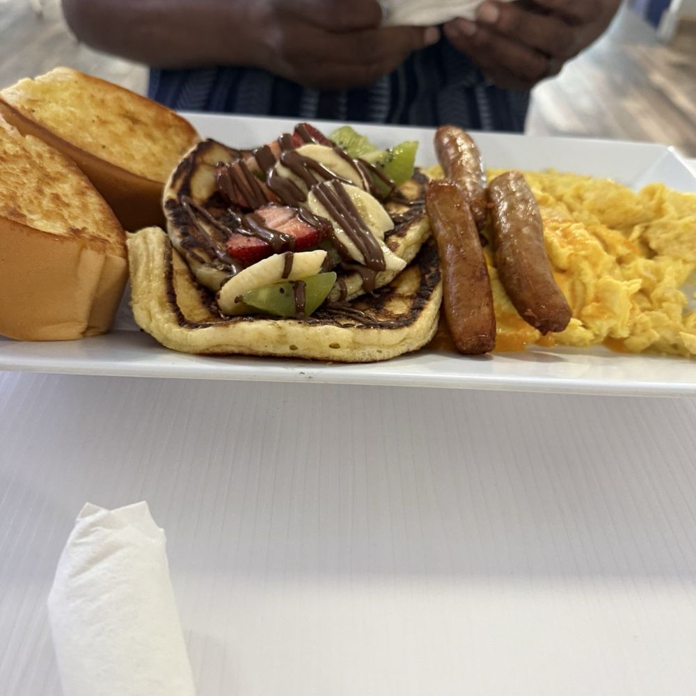 Pannes - Famous French toast with Nutella and side of sausage - Breakfast & Brunch Near Me - San Juan, Puerto Rico Pannes - Famous French toast with Nutella and side of sausage - Breakfast & Brunch Near Me - San Juan, Puerto Rico