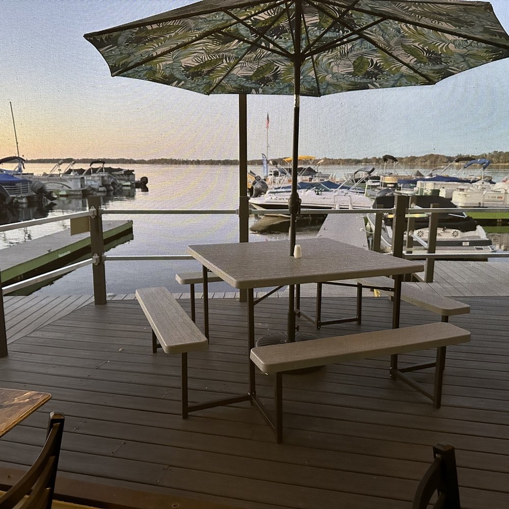 Lake Eustis Waterfront Grille - Outdoor dining overlooking the docks - Seafood Near Me - Eustis, Florida Lake Eustis Waterfront Grille - Outdoor dining overlooking the docks - Seafood Near Me - Eustis, Florida