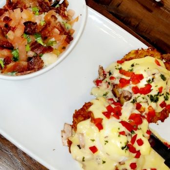 Another Broken Egg Cafe - Hash brown Benedict w/ city grits - Breakfast & Brunch Near Me - West Chester Township, Ohio Another Broken Egg Cafe - Hash brown Benedict w/ city grits - Breakfast & Brunch Near Me - West Chester Township, Ohio