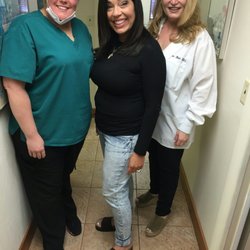 Davie Dental - After almost a year of treatments and my now dazzling smile, here I am with my great team, Dr. Sherri Bluth and Jessica.