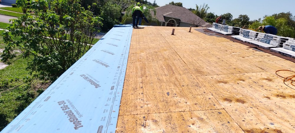 Slide of Millennia Roofing Solutions
