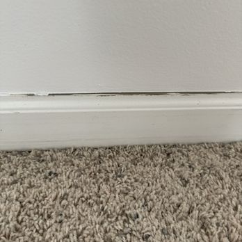 Revival Painting and Repairs - Paint underneath is still visible he did not caulk the edges of the trim - Painters Near Me Revival Painting and Repairs - Paint underneath is still visible he did not caulk the edges of the trim - Painters Near Me