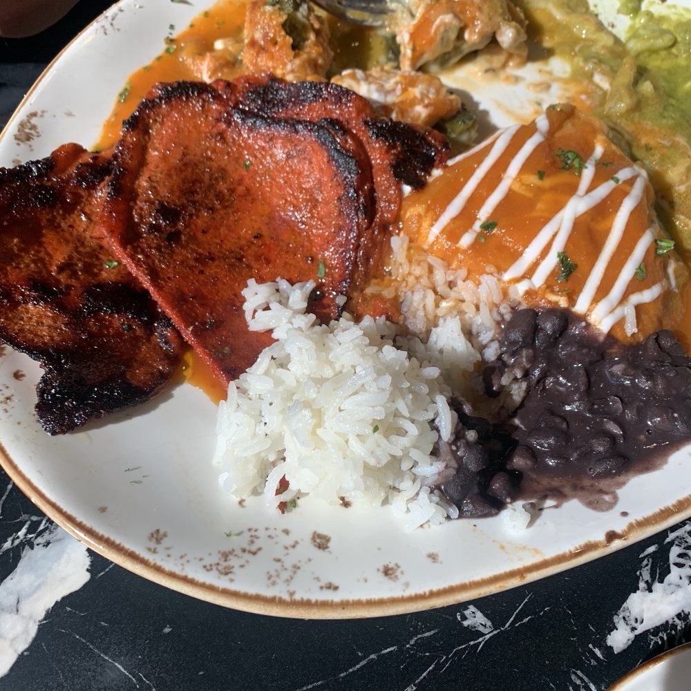 El Buen Pastor - The combo plate with cecina de puerco, chile relleno, and shrimp poblano enchilada - Mexican Near Me - Bakersfield, California El Buen Pastor - The combo plate with cecina de puerco, chile relleno, and shrimp poblano enchilada - Mexican Near Me - Bakersfield, California