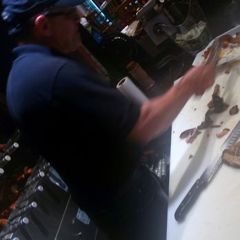 Oliveira's Steak House - The BBQ master at work - Brazilian Near Me - Boston, Massachusetts Oliveira's Steak House - The BBQ master at work - Brazilian Near Me - Boston, Massachusetts