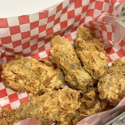 Chisholms Restaurant - Hand breaded jalapeño poppers