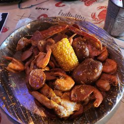Had headless shrimp,crab clusters corn,potatoes and sausage with hook and real sauce. Pretty good