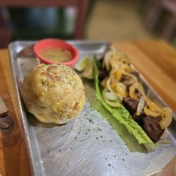 La Casa Del Mofongo - Mofongo (smashed plantains) with fried pork chunks