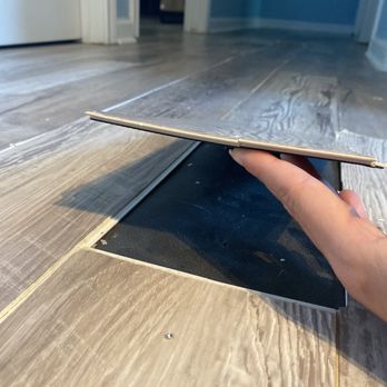 Evergreen Wood Floors - 1 year after installation, floor is lifting - Flooring Near Me Evergreen Wood Floors - 1 year after installation, floor is lifting - Flooring Near Me