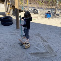 Explorer Preschool - Playing outside in the sand