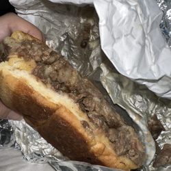 Tortas y tacos la Palma 2 - A fajita torta with melted cheese, mayo and beans.