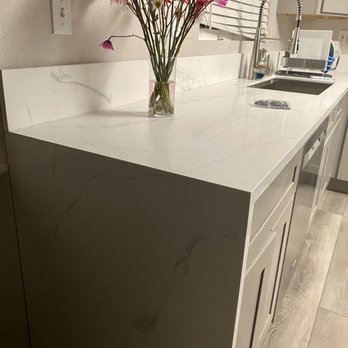 SoCal Granite and Marble - Quartz countertop with waterfall. - Countertop Installation Near Me