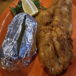 Scobey's Pub & Grub - Fried walleye dinner with baked potato.