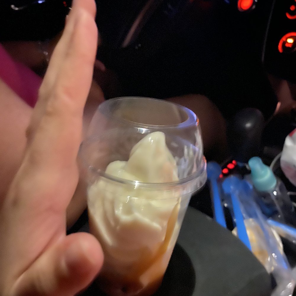 Checkers - a hand holding a cup of ice cream - Burgers Near Me - Miami, Florida Checkers - a hand holding a cup of ice cream - Burgers Near Me - Miami, Florida