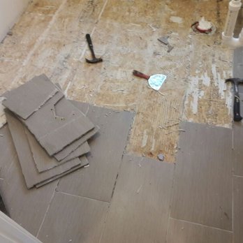 MET & Sons - Tear up a new floor because theilman didn't know what they were doing and the whole floor popped - Handyman Near Me