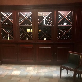 J Gilbert's - Wine Cellar next to the Host Stand. - Steakhouses Near Me - McLean, Virginia