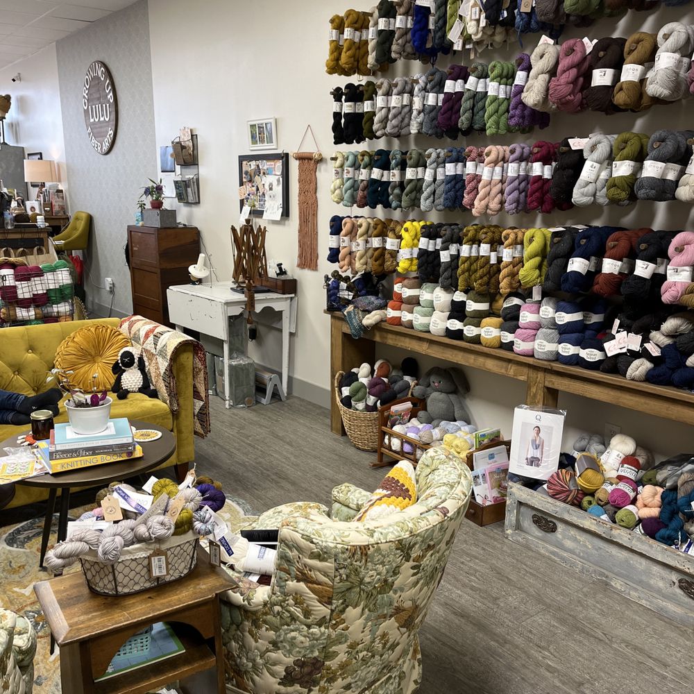 Growing Up Lulu Fiber Arts - yarn wall and cozy sitting area - Embroidery & Crochet Near Me - Sergeant Bluff, Iowa