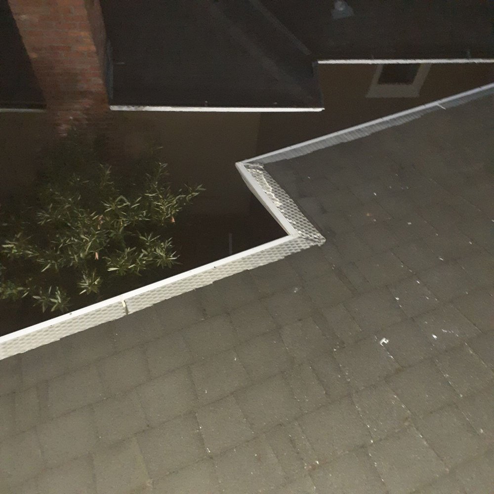 Slide of JB Rain Gutter installation