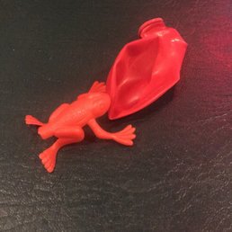 a red plastic frog
