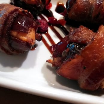 Cedar Street Grille - "Crazy dates" close-up. Sweet dates, creamy goat cheese, salty bacon...The perfect bite. - New American Near Me - Sturbridge, Massachusetts