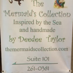 The Mermaid's Collection - Front sign. Next to front door.