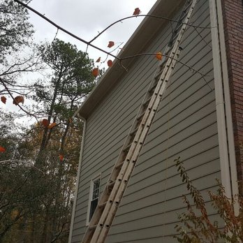 PCS Contracting - a man on a ladder working on a house - Decks & Railing Near Me - Marietta, Georgia PCS Contracting - a man on a ladder working on a house - Decks & Railing Near Me - Marietta, Georgia
