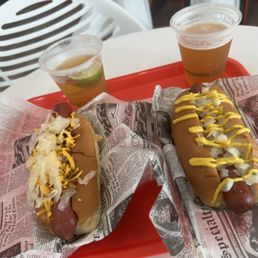 We both had a couple of beers with our hotdogs We both had a couple of beers with our hotdogs