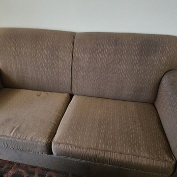Hampton Inn & Suites Bastrop - Couch is dirty as you can see the dark spots - Hotels Near Me - Bastrop, Texas