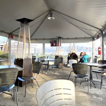 Maggie Bluffs - Physically distanced seating in tent with heaters, TVs and lighting - Seafood Near Me - Seattle, Washington Maggie Bluffs - Physically distanced seating in tent with heaters, TVs and lighting - Seafood Near Me - Seattle, Washington