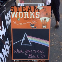 a chalk board advertising a craft beer a chalk board advertising a craft beer