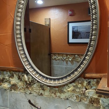 Half Shell Oyster House - Empty Oyster shells are used as a decorative border. - Seafood Near Me - Biloxi, Mississippi Half Shell Oyster House - Empty Oyster shells are used as a decorative border. - Seafood Near Me - Biloxi, Mississippi